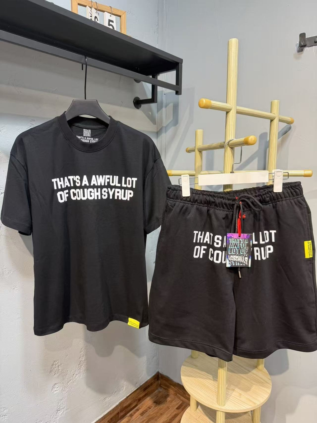 THAT'S A AWFUL LOT OF COUGH SYRUP Bold Wordmark Short-Sleeve Set